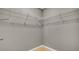 Walk-in closet with wire shelving, ready for organizing your wardrobe at 225 Babson Dr, Babson Park, FL 33827