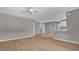 A spacious living room offers a seamless transition to an adjacent kitchen area at 225 Babson Dr, Babson Park, FL 33827