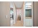 Hallway with access to the living room, bedroom, and bathroom at 225 Highgate Park Blvd, Davenport, FL 33897