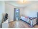 This is a bedroom with a window and a TV at 238 Lake Eloise Pointe Blvd, Winter Haven, FL 33880