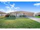 Charming single-story home with a well-maintained lawn and appealing curb appeal at 238 Lake Eloise Pointe Blvd, Winter Haven, FL 33880