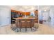 Spacious kitchen with a large island, ample seating, and modern appliances at 238 Lake Eloise Pointe Blvd, Winter Haven, FL 33880