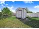 Close-up of storage shed located in a fenced backyard at 238 Lake Eloise Pointe Blvd, Winter Haven, FL 33880