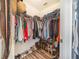 Organized walk-in closet with shelving and space for shoes and clothes at 238 Lake Eloise Pointe Blvd, Winter Haven, FL 33880