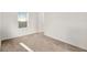 Carpeted bedroom with a window, featuring neutral paint and plenty of natural light at 271 Inman Blvd, Winter Haven, FL 33881