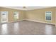 Bright living room with large windows and tile floors, ideal for relaxation and comfort at 271 Inman Blvd, Winter Haven, FL 33881