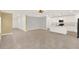 Open-concept living room with neutral walls and tile flooring, perfect for entertaining at 271 Inman Blvd, Winter Haven, FL 33881