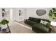 Comfortable living room featuring plush carpet, stylish decor, and natural light at 271 Inman Blvd, Winter Haven, FL 33881