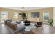 Inviting living room with neutral tones, large windows, and stylish furnishings at 271 Inman Blvd, Winter Haven, FL 33881