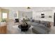 Spacious living room open to modern kitchen and dining area, perfect for entertaining at 271 Inman Blvd, Winter Haven, FL 33881
