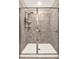 Walk-in shower featuring a glass door and modern fixtures at 271 Inman Blvd, Winter Haven, FL 33881