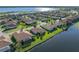 Overhead shot showing the property's prime waterfront location in a vibrant community with well-manicured lawns at 3014 Ashton Palms Dr, Lake Wales, FL 33859