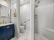 Well-lit bathroom with a marble sink, toilet room, and walk-in shower at 3014 Ashton Palms Dr, Lake Wales, FL 33859