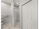 Handicap accessible bathroom featuring a walk-in shower with a bench and grab bars at 3014 Ashton Palms Dr, Lake Wales, FL 33859
