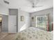 Comfortable bedroom with a ceiling fan, closet, and floral curtains at 3014 Ashton Palms Dr, Lake Wales, FL 33859