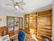 Spacious office featuring a bookshelf, french doors, and a work space at 3014 Ashton Palms Dr, Lake Wales, FL 33859