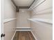 Walk-in closet with built-in shelving for maximum storage capacity at 319 Thomas Ave, Frostproof, FL 33843