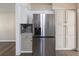 Kitchen with stainless steel appliances and modern cabinets at 319 Thomas Ave, Frostproof, FL 33843