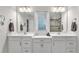Bright bathroom featuring double vanity, and attractive lighting at 3217 La Salle St, Winter Haven, FL 33884