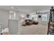 Upstairs loft area with a comfortable brown sectional sofa and natural light from the windows at 3217 La Salle St, Winter Haven, FL 33884