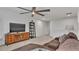 Open loft area with a sectional sofa, media center and plenty of space for entertaining at 3217 La Salle St, Winter Haven, FL 33884