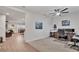 A versatile office space near the entry with a ceiling fan and natural light at 3217 La Salle St, Winter Haven, FL 33884