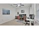 Versatile office space with a ceiling fan, neutral carpet, and a good source of natural light at 3217 La Salle St, Winter Haven, FL 33884