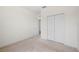 Bedroom with closet, carpet floor, and neutral walls and trim at 336 Summer Squall Rd, Davenport, FL 33837