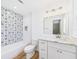 Bathroom featuring subway tile, decorative tile accent, and a modern vanity at 3736 Knights Station Rd, Lakeland, FL 33810