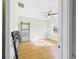 Sunlit bedroom featuring hardwood floors and neutral wall paint at 3736 Knights Station Rd, Lakeland, FL 33810