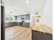Large kitchen with stainless appliances, white backsplash, and gray cabinetry at 3736 Knights Station Rd, Lakeland, FL 33810