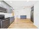 Bright, updated kitchen with stainless appliances and gray cabinetry at 3736 Knights Station Rd, Lakeland, FL 33810