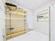 Well-lit pantry with shelves and ample storage space at 3736 Knights Station Rd, Lakeland, FL 33810