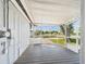 Inviting screened porch providing relaxing views of the outdoors at 3736 Knights Station Rd, Lakeland, FL 33810