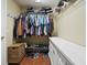 Walk-in closet with shelving, clothing racks, and storage space for shoes and other items at 3905 Osprey Pointe Cir, Winter Haven, FL 33884