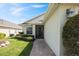 Inviting front entrance with well-kept landscaping and brick pathway at 3905 Osprey Pointe Cir, Winter Haven, FL 33884