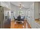 Sunlit breakfast nook with hardwood floors and stylish cabinetry at 3905 Osprey Pointe Cir, Winter Haven, FL 33884