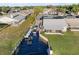 Waterfront property aerial view showing a private dock, boat lift, and canal access to a waterway at 4016 Cypress S Lndg, Winter Haven, FL 33884