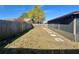 Backyard with grassy area and screened porch at 4016 Cypress S Lndg, Winter Haven, FL 33884