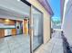 View from patio to the kitchen with stainless steel appliances and tile floors at 4016 Cypress S Lndg, Winter Haven, FL 33884