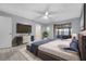 Main bedroom with ensuite bath and access to the screened lanai at 4016 Cypress S Lndg, Winter Haven, FL 33884