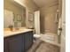 Bathroom featuring a vanity with a modern sink, a toilet, and a bathtub with a shower at 4088 Dunmore Dr, Lake Wales, FL 33859