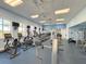Bright gym with multiple treadmills, exercise bikes, weight machines, and ceiling fans at 4088 Dunmore Dr, Lake Wales, FL 33859