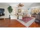 Comfortable living room features hardwood floors, ample seating, and natural light at 4088 Dunmore Dr, Lake Wales, FL 33859