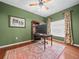 A home office that is well-lit and with an area rug for a comfortable space at 4088 Dunmore Dr, Lake Wales, FL 33859