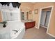 Bright bathroom featuring a garden tub, granite countertop vanity, and a separate shower at 451 Montara Dr, Davenport, FL 33897