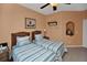Bedroom featuring two twin beds, ceiling fan, and window at 451 Montara Dr, Davenport, FL 33897