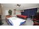 Spacious game room featuring a pool table, air hockey and foosball table with casual seating at 451 Montara Dr, Davenport, FL 33897