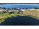 Beautiful lakefront property with lush lawn at 4717 Emerald Palms Ct, Winter Haven, FL 33884