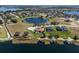 A beautiful neighborhood filled with luxurious homes on a scenic lake at 4717 Emerald Palms Ct, Winter Haven, FL 33884